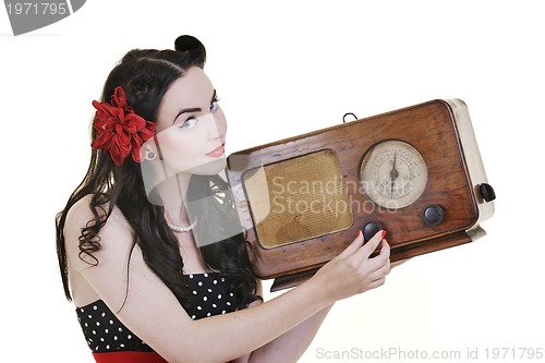 Image of pretty girl listening music on  radio