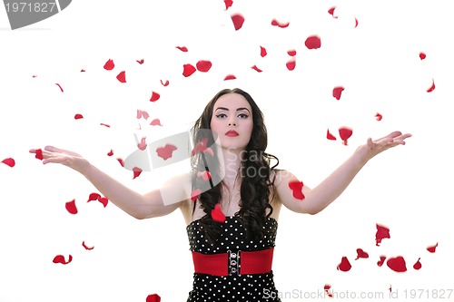 Image of woman with falling rose petals