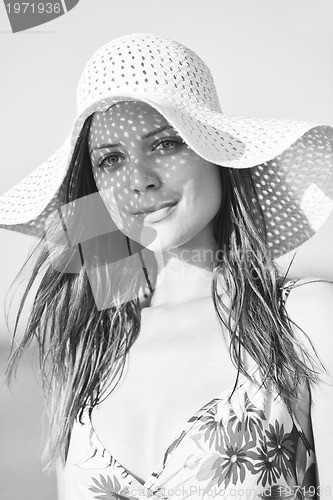 Image of young woman relax  on beach