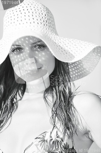 Image of young woman relax  on beach