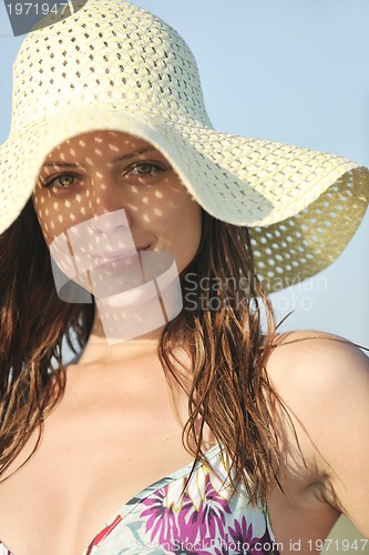 Image of young woman relax  on beach