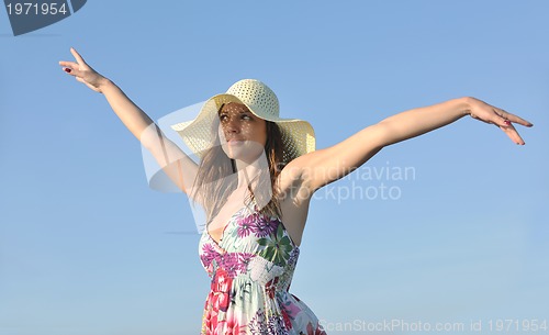 Image of young woman relax  on beach