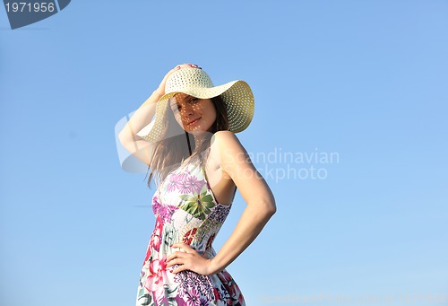 Image of young woman relax  on beach