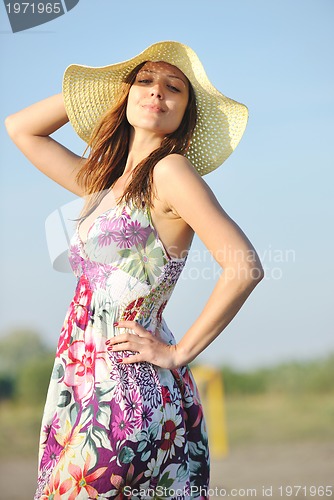 Image of young woman relax  on beach