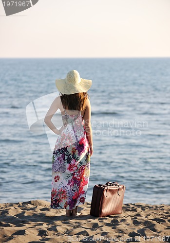 Image of young woman relax  on beach