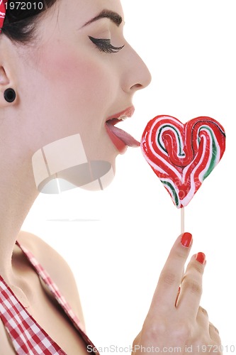 Image of happy woman with lollipop isolated on white 