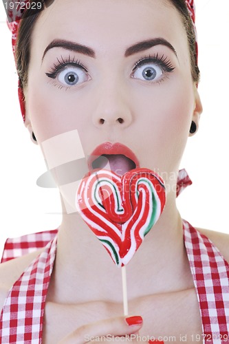 Image of happy woman with lollipop isolated on white 