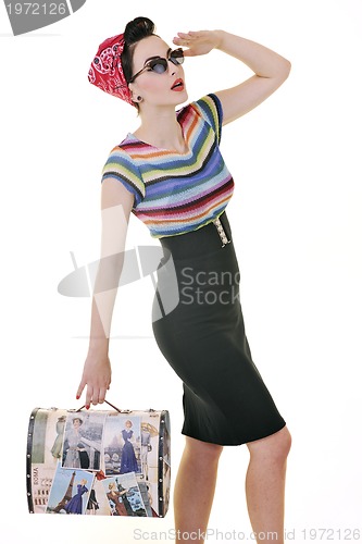 Image of pretty young happy woman with travel bag waiting and posing isol