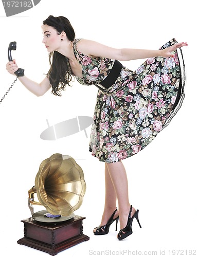 Image of pretty woman talking by phone