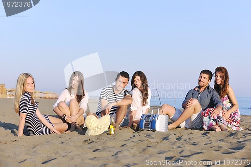 Image of happy young  people group have fun on beach