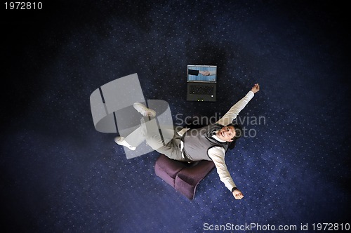 Image of Photo of happy winner businessman  screaming from joy 