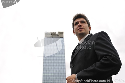 Image of Photo of happy winner businessman  screaming from joy