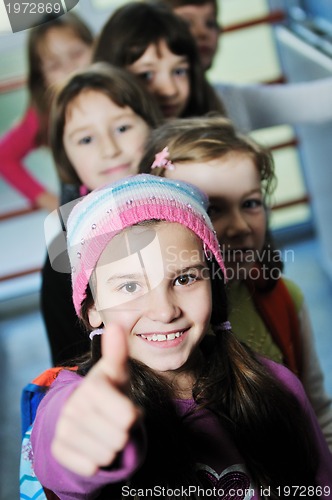 Image of happy children group in school