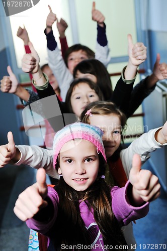 Image of happy children group in school