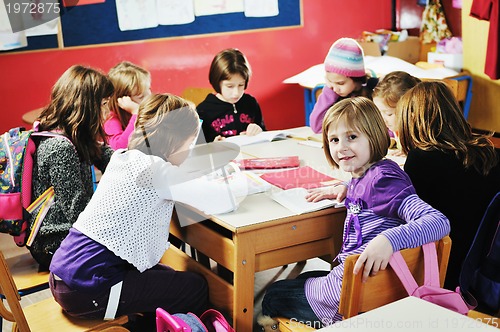 Image of happy children group in school