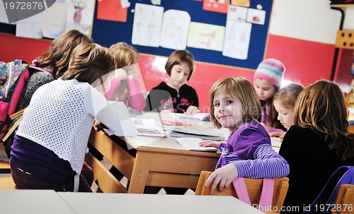 Image of happy children group in school