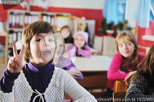 Image of happy children group in school