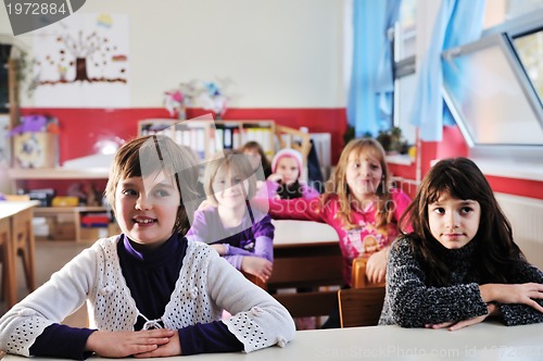 Image of happy children group in school