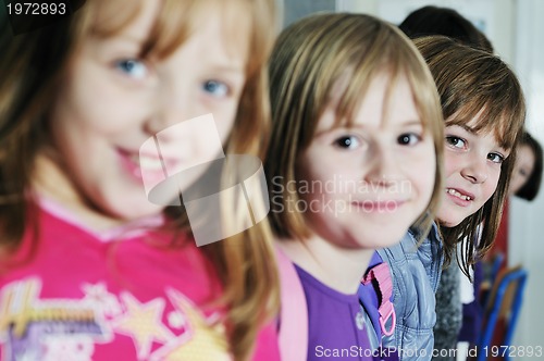 Image of happy children group in school