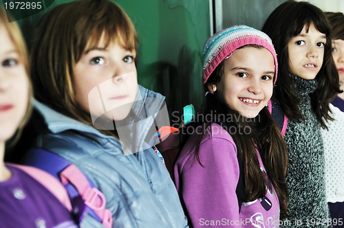 Image of happy children group in school