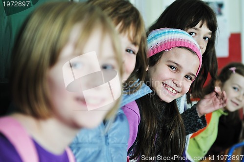 Image of happy children group in school