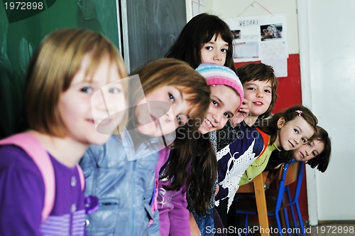 Image of happy children group in school