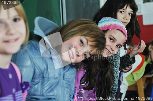 Image of happy children group in school