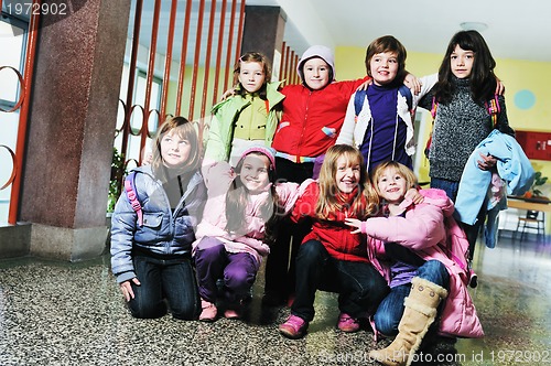 Image of happy children group in school