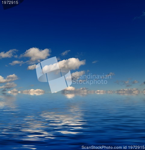 Image of blue sky with water  reflection