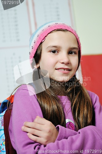 Image of happy school girl on math classeshappy school girl on math class