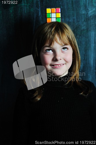 Image of happy school girl on math classeshappy school girl on math class