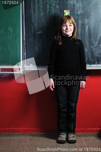 Image of happy school girl on math classeshappy school girl on math class