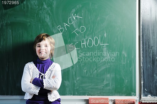 Image of happy young school girl portrait