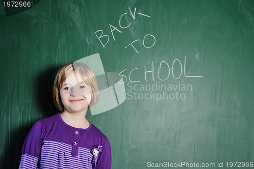 Image of happy young school girl portrait