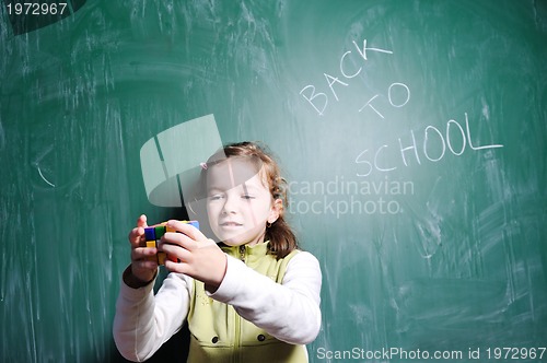 Image of happy young school girl portrait