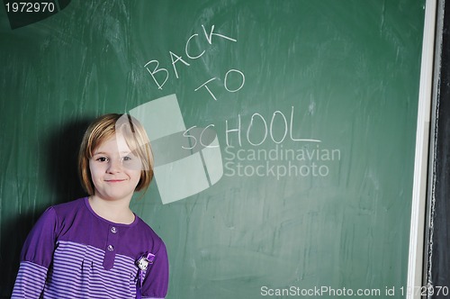 Image of happy young school girl portrait
