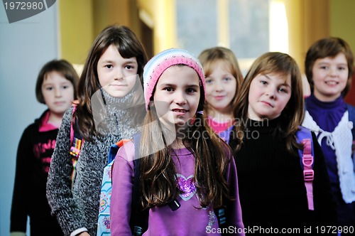 Image of happy children group in school