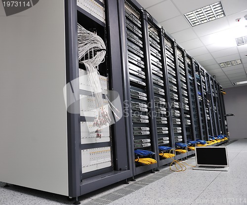 Image of laptop computer at server network room