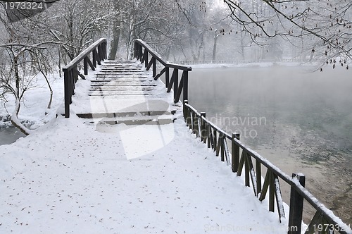 Image of small wooden bridge at winter