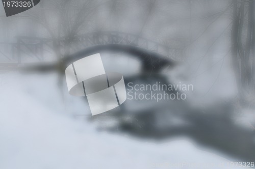 Image of small wooden bridge at winter