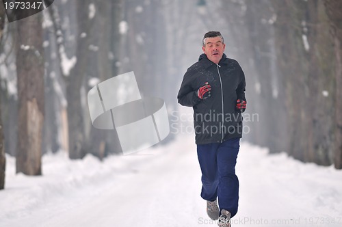 Image of one older man running at alley 