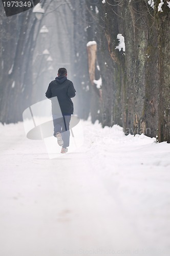 Image of one older man running at alley 