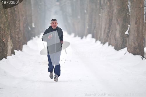 Image of one older man running at alley 