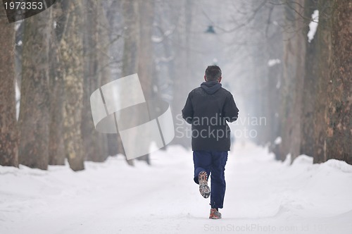 Image of one older man running at alley 