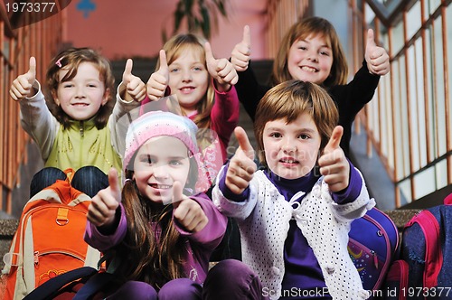 Image of happy children group in school