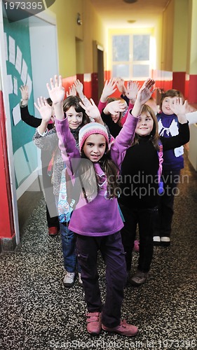 Image of happy children group in school