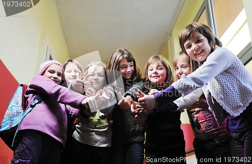 Image of happy children group in school