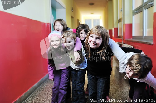 Image of happy children group in school