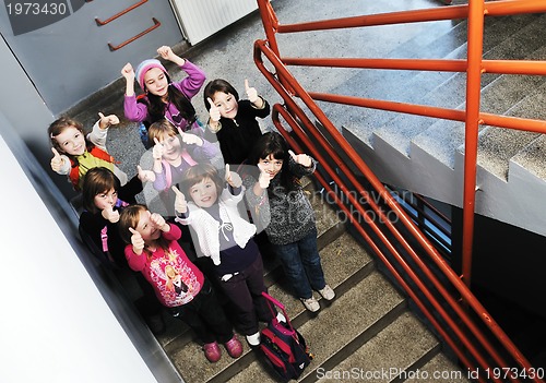 Image of happy children group in school