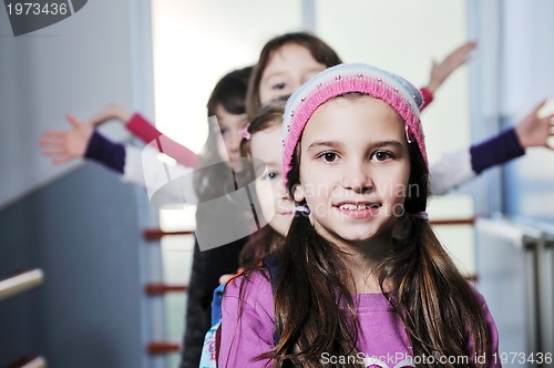 Image of happy children group in school